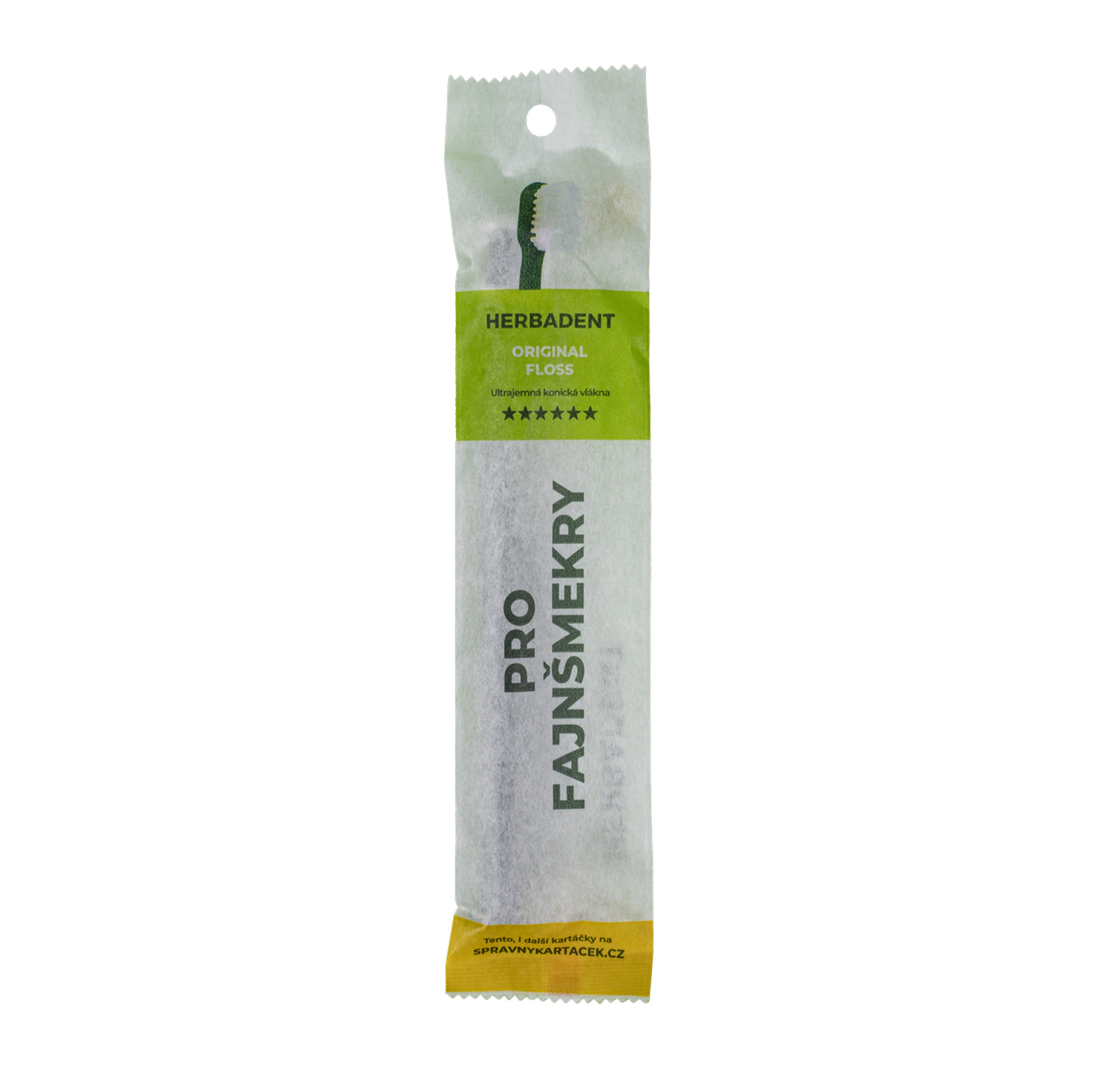 Packaged dental toothbrush with visible branding on a white background