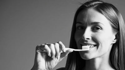 A close-up black-and-white video of a woman gently holding her teeth with toothbrush. She smiles confidently, with a minimalist background and smooth motion emphasizing cleanliness and routine.

Disclaimer:
This video was created using AI. The product appearance does not reflect its actual look in real life.